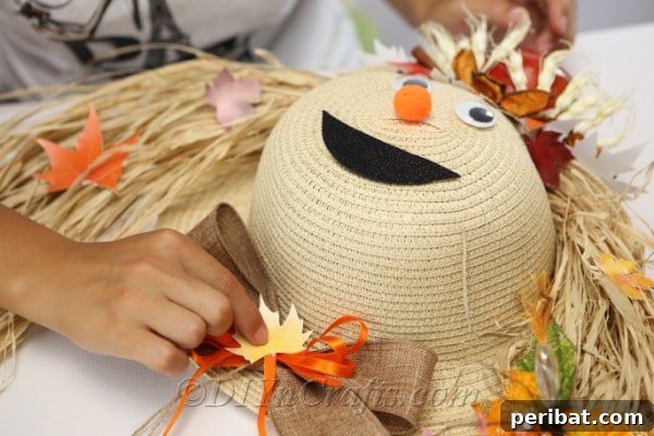 Adding the final decorations to your harvest decor scarecrow