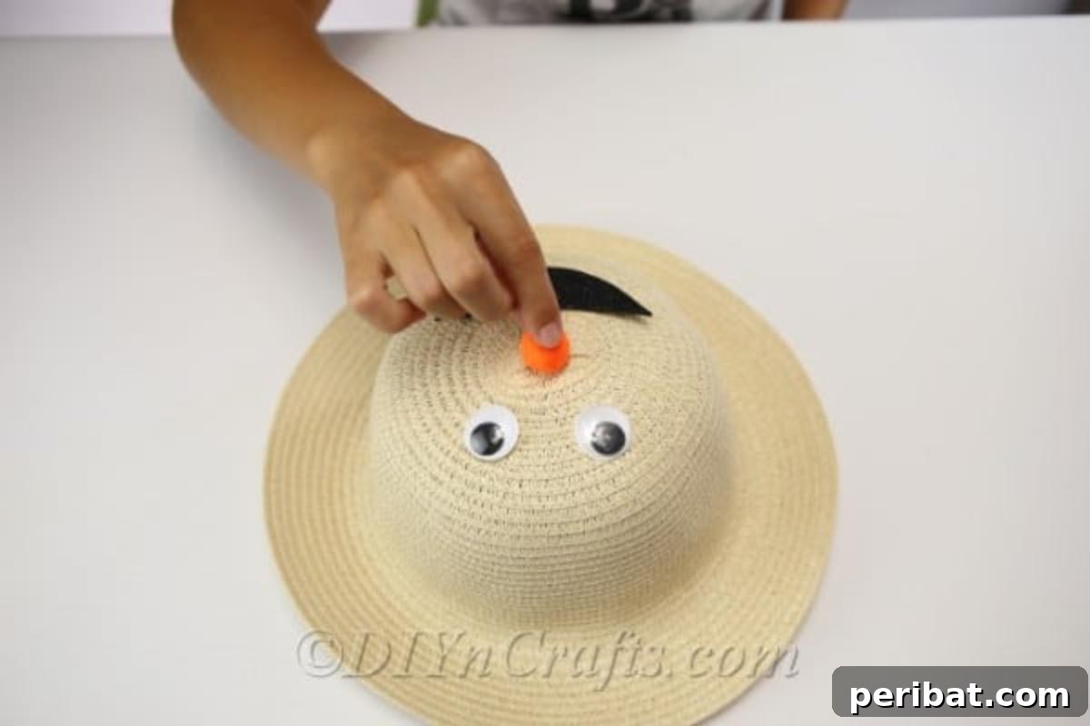Adding a face to your straw hat scarecrow
