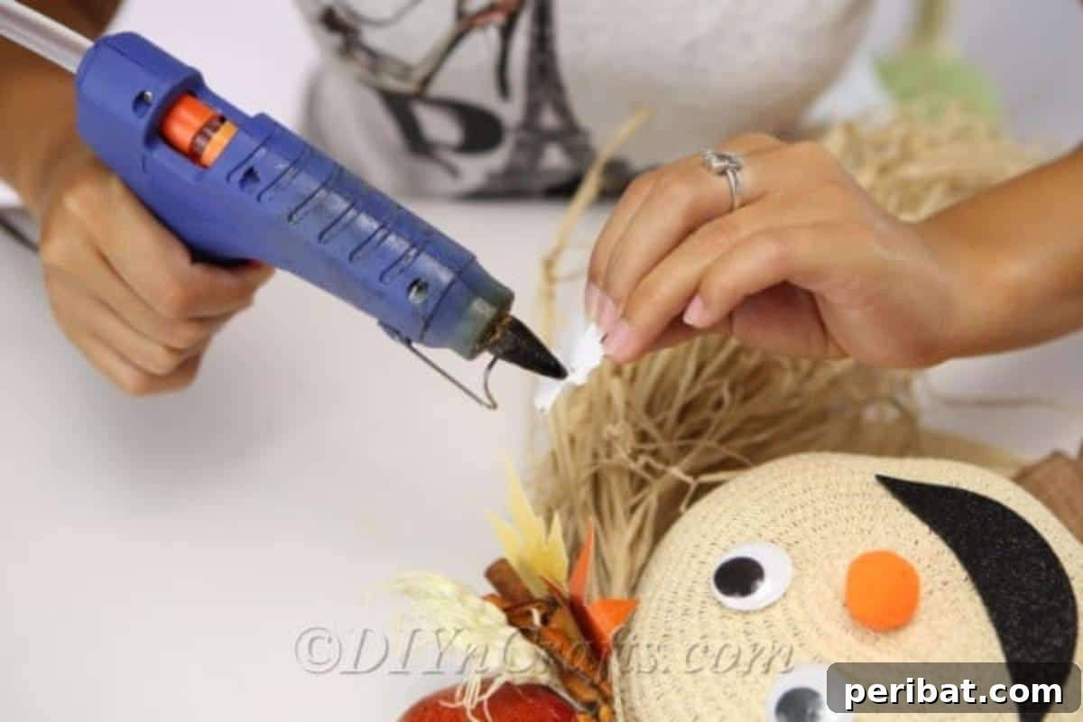 Adding decorations to your scarecrow harvest decor