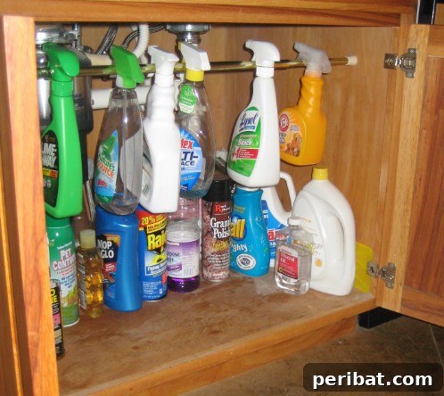 25 Genius Cleaning Shortcuts for a Sparkling Home 16 Under-Sink Organization with Tension Rods