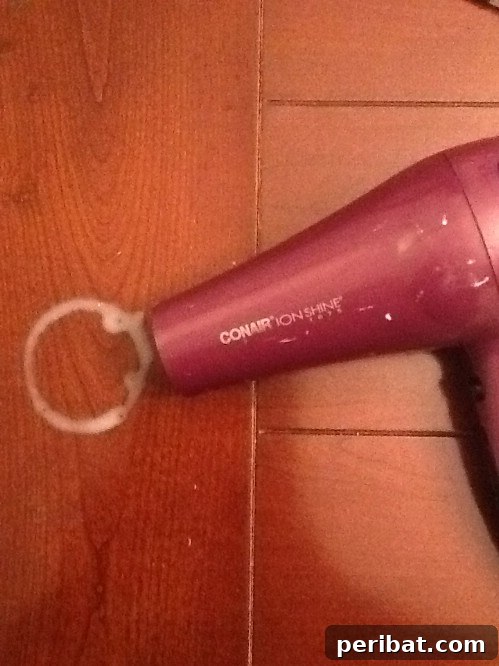 25 Genius Cleaning Shortcuts for a Sparkling Home 10 Remove Water Rings with a Blow Dryer