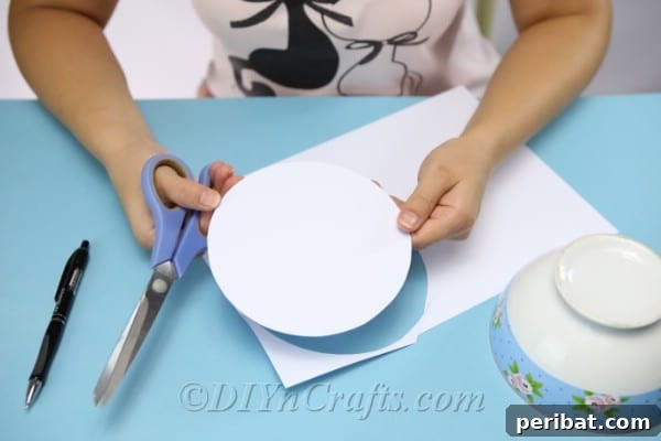 Craft Charming Pumpkin Gift Boxes 8 Cutting the traced circles out of the cardstock to create a DIY gift box