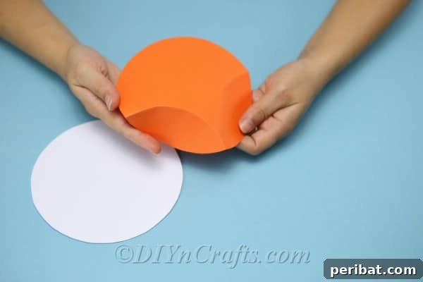 Craft Charming Pumpkin Gift Boxes 10 Folding the cardstock along the drawn arc lines to form the sides of the gift box