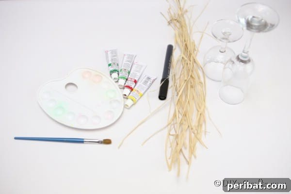 Supplies for making a wine glass pumpkin art piece