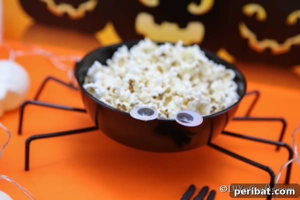 Up close picture of spider bowl filled with popcorn