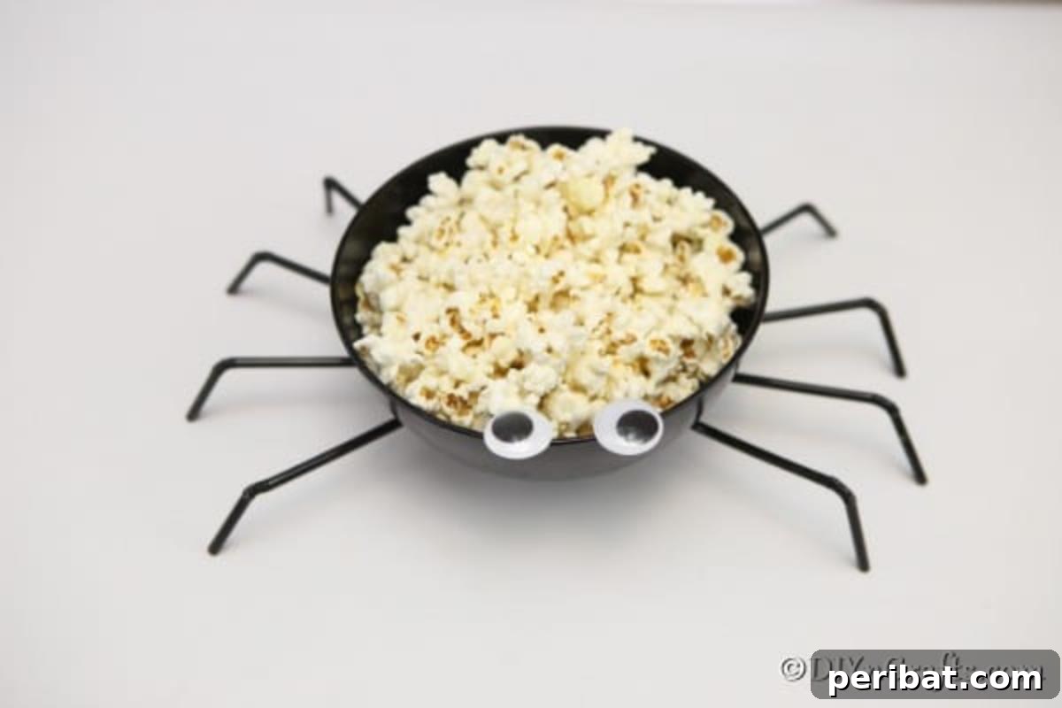 Halloween Spider Web Treat Bowl DIY 3 A completed spider bowl for Halloween parties