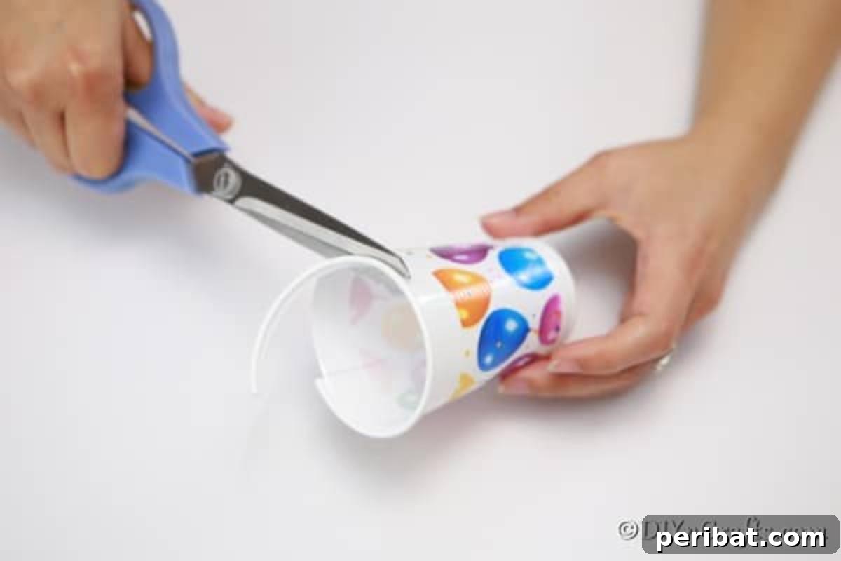 Cutting the lip of the cup off for homemade cookie boxes