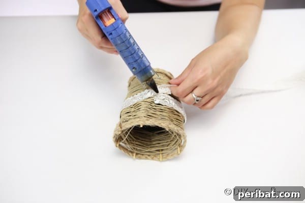 Craft a Charming Rustic Basket 17 Adding lace to the woven basket with hot glue