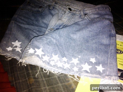 40 Smart & Easy DIY Shorts for Summer 33 DIY starry night cut-off shorts with white fabric paint and star stencils