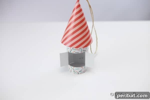 A completed gnome house on a white counter ready for display