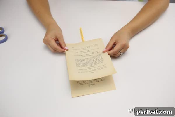 Gluing the pages of a book together for a decorative feathers project