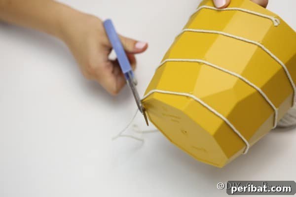 Whimsical Bee Garden Planter 15 Finish attaching the white thread to outside of beehive bee decoration flower pot
