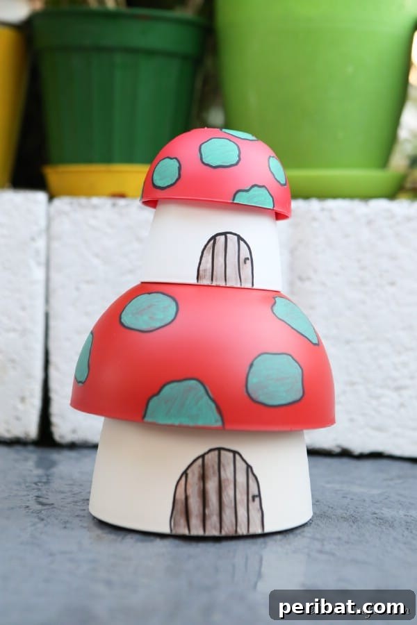 Whimsical Hand-Painted Mushroom Garden Planter 14 Mushroom planter fairy houses playfully stacked on top of each other, creating a whimsical tower