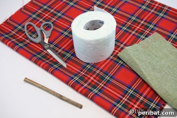 Preparing the square fabric and gathering supplies for the fabric pumpkin craft.