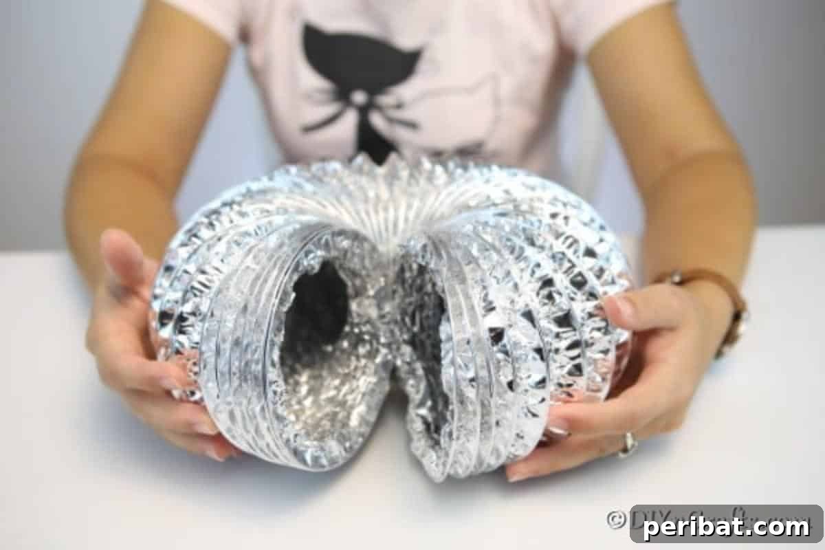 Easy DIY Dryer Vent Pumpkins Video Tutorial Included 7 Cutting dryer vent pipe to correct size for pumpkin decor