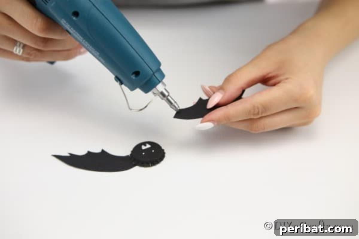 Gluing wings on the bat magnet