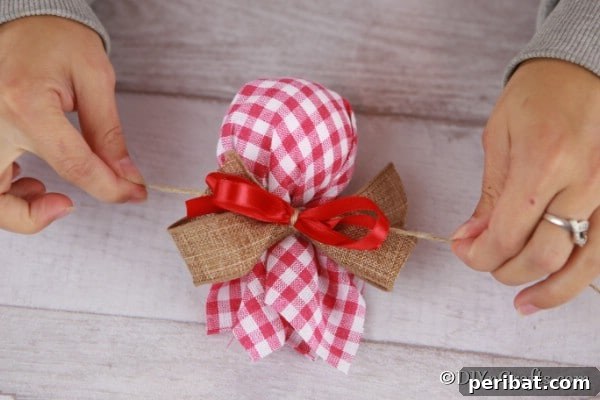 Cozy Plaid Tree Adornments 12 Adding a second ribbon to the Christmas tree ornaments