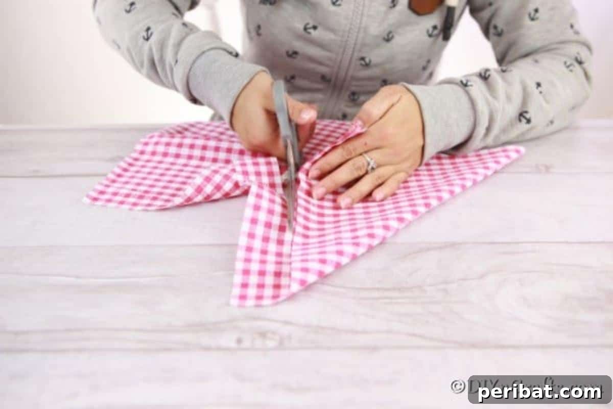 Cozy Plaid Tree Adornments 8 Cutting fabric to create a christmas tree ornament