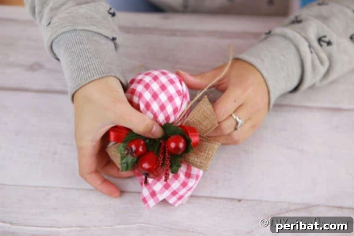 Cozy Plaid Tree Adornments 13 Adding embellishments to the christmas tree ornaments
