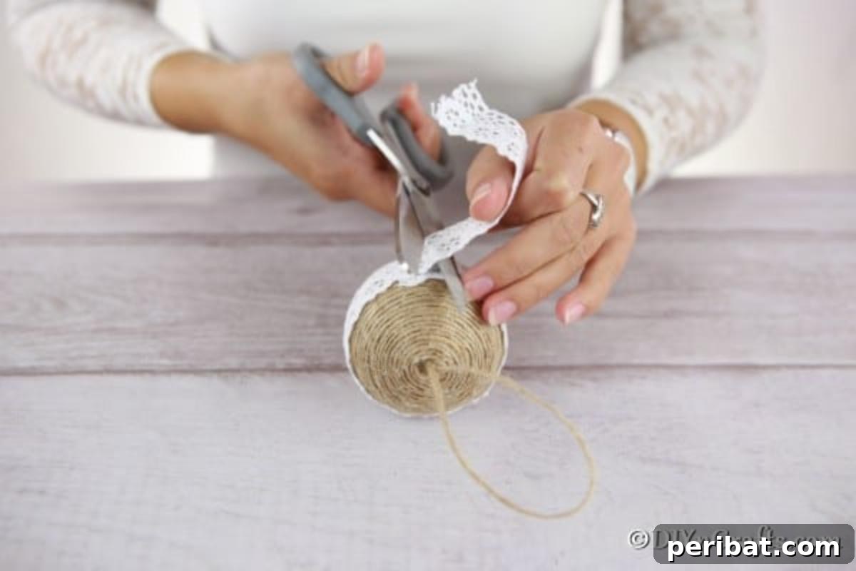 Adding lace to the middle of the rustic Christmas ornaments