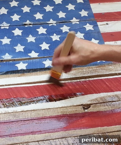 Festive Red, White, and Blue Crafts for an Unforgettable Fourth of July 12 Rustic Pallet Flag