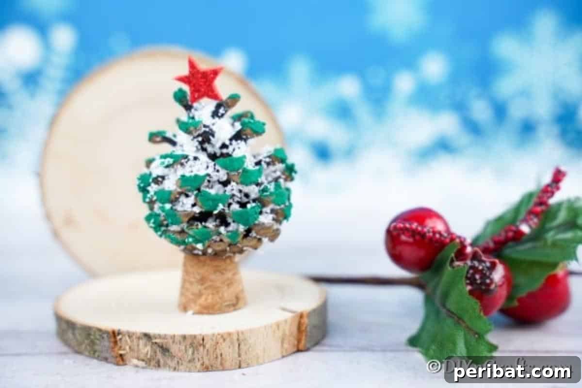 Tiny Pinecone Christmas Ornament 3 A small homemade painted pine cone ornament for Christmas on a table with a serene blue background