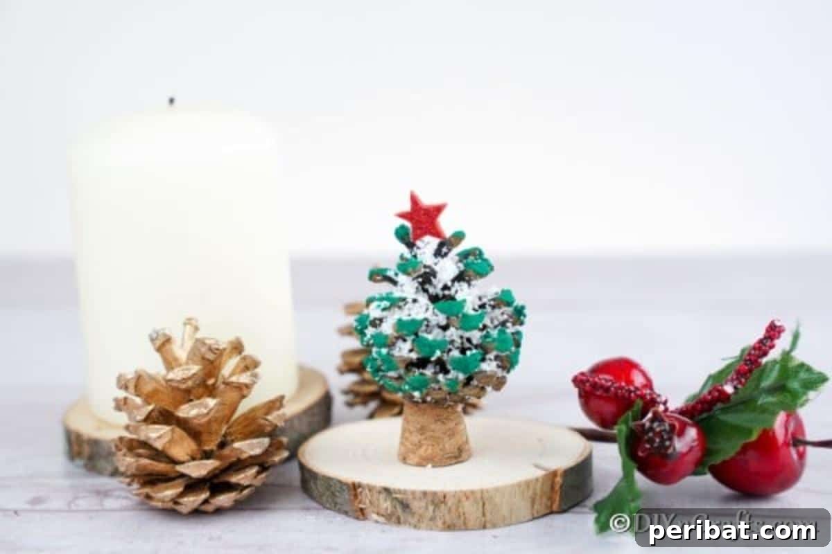 Tiny Pinecone Christmas Ornament 11 A completed miniature pine cone ornament displayed on a decorative slice of wooden tree trunk