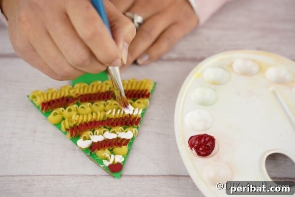 Whimsical Pasta Christmas Tree Decor 12 Painting a pasta tree Christmas decoration craft