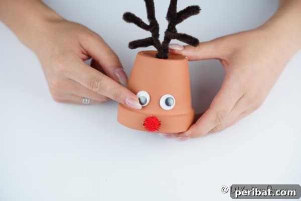 Whimsical Clay Pot Reindeer Christmas Creations 21 Making a reindeer christmas decoration with flower pots and spiky horns