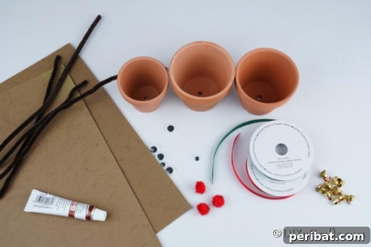 Whimsical Clay Pot Reindeer Christmas Creations 6 A meticulously arranged collection of craft supplies required to create a charming clay pot reindeer Christmas decoration, including paints, ribbons, googly eyes, and flower pots.