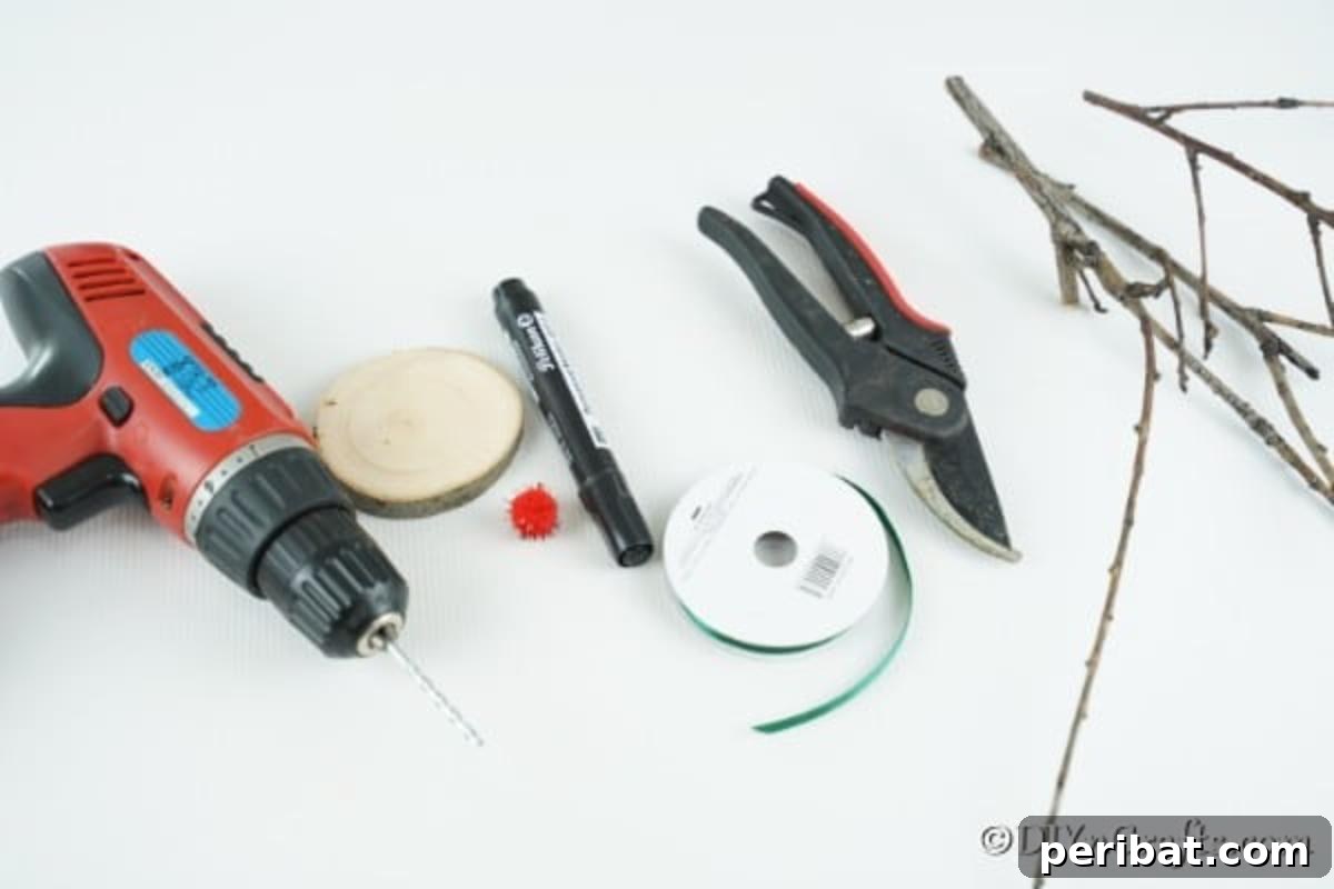 All the supplies needed to create a wood slice reindeer ornament laid out neatly on a surface.