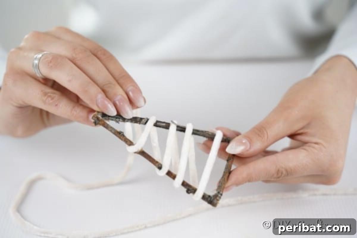 Gluing ribbon onto twig tree for rustic ornaments
