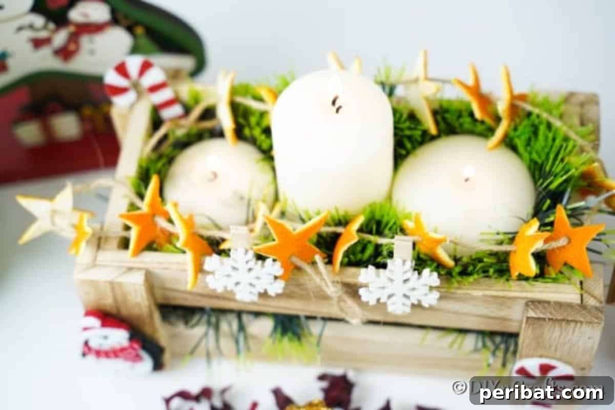 Rustic Chic Orange Peel Star Winter Garland 5 Orange star garland on a simple mantle with candles and greenery