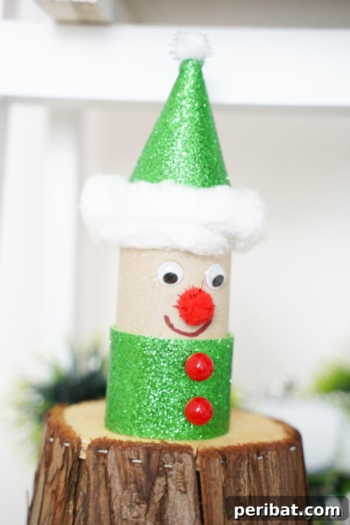 Upcycled Toilet Roll Santa Snowman and Elf for Kids 26 An endearing elf toilet paper roll craft, proudly displayed and showcasing all its charming handmade details.