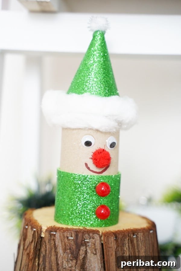 Upcycled Toilet Roll Santa Snowman and Elf for Kids 36 An elf toilet paper roll craft on display