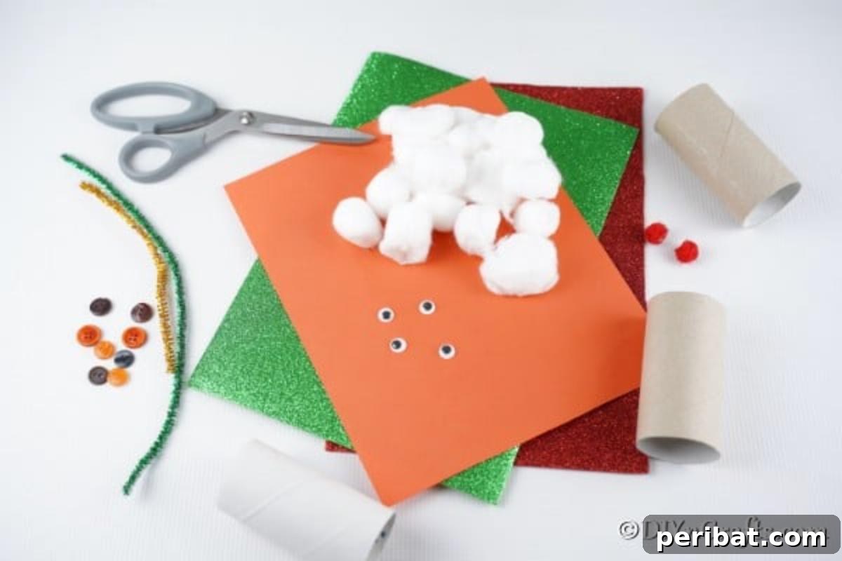 Upcycled Toilet Roll Santa Snowman and Elf for Kids 6 A charming assortment of craft supplies for making toilet paper roll Christmas characters, neatly arranged on a white table.