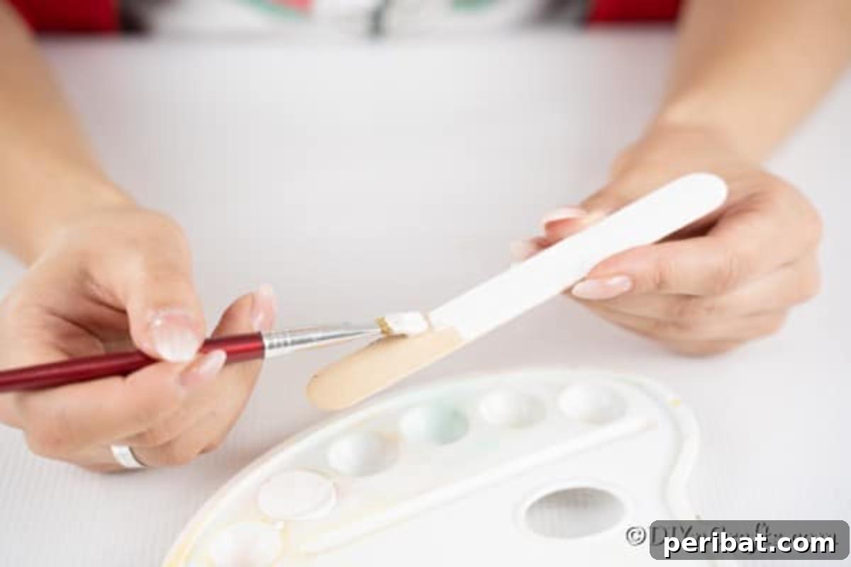 Painting craft sticks white