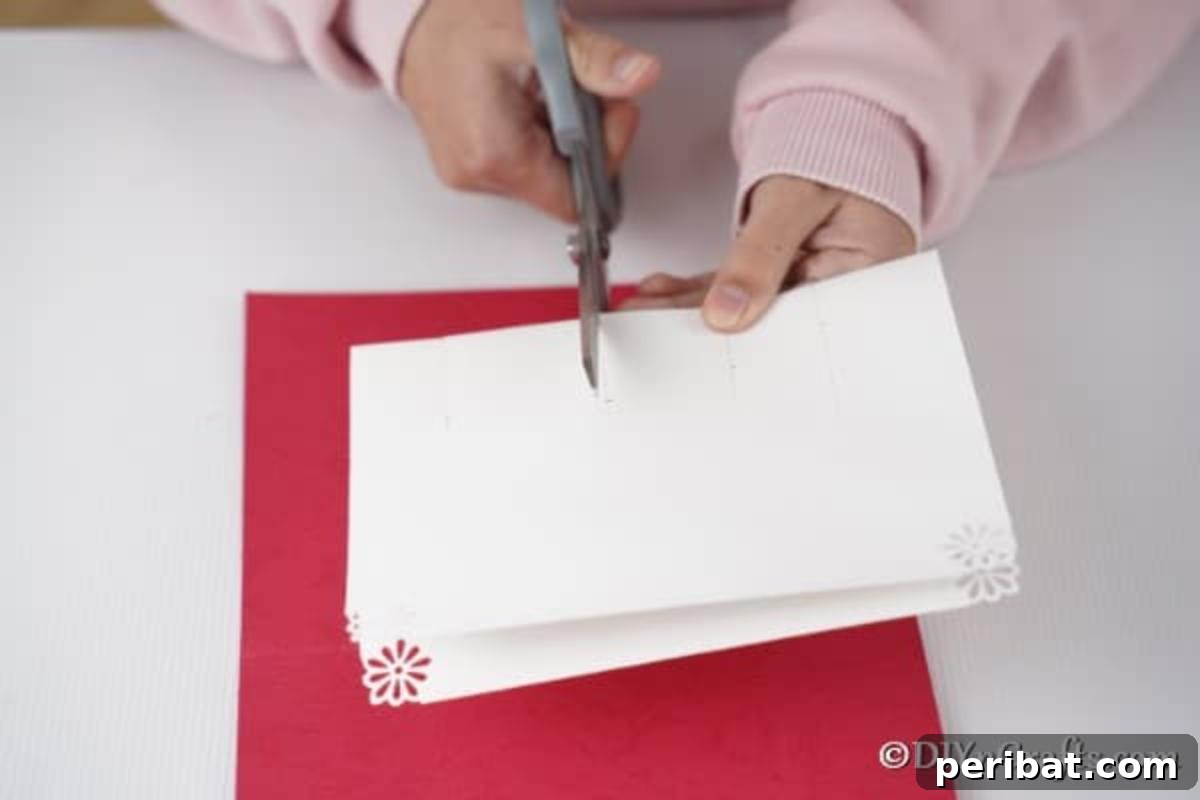 Cutting lines to create gift boxes on the 3D Christmas card