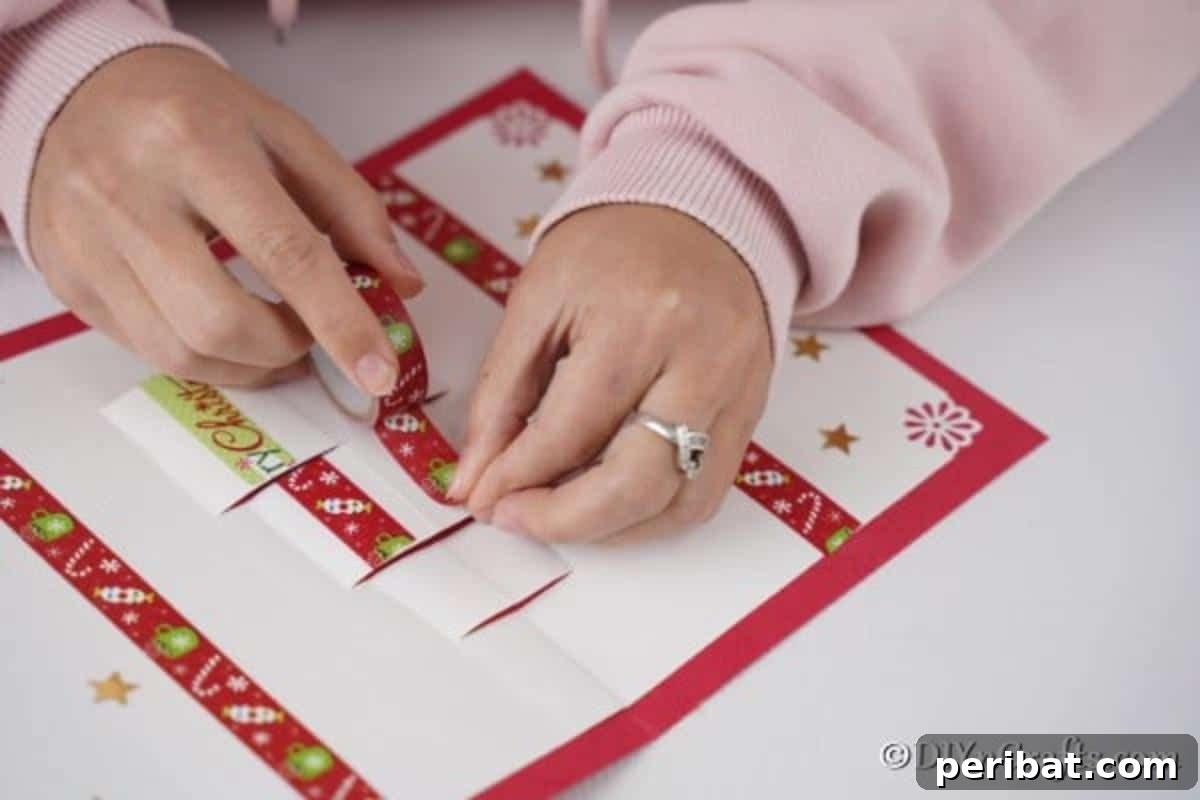 Decorating the gift boxes on a 3D Christmas card with washi tape