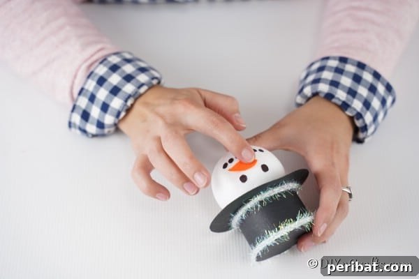Adding the nose to the snowman face