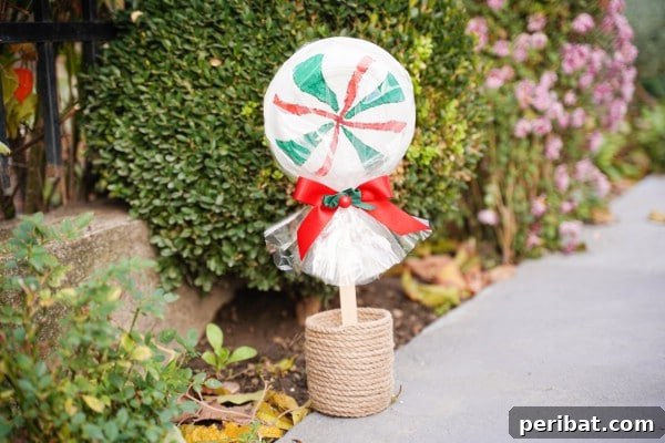 DIY Giant Lollipops Christmas Decoration: A festive outdoor display