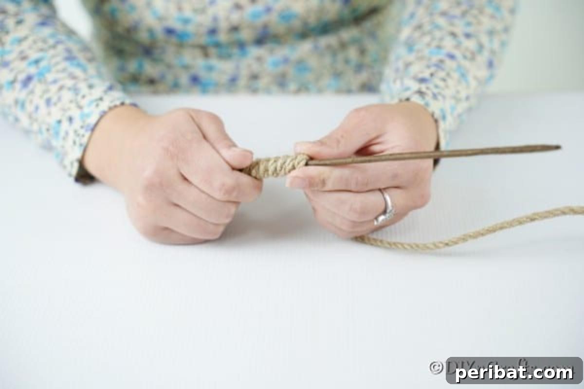 Farmhouse Jute Candy Cane Bauble 8 Attaching rustic twine around the candy cane ornament wire