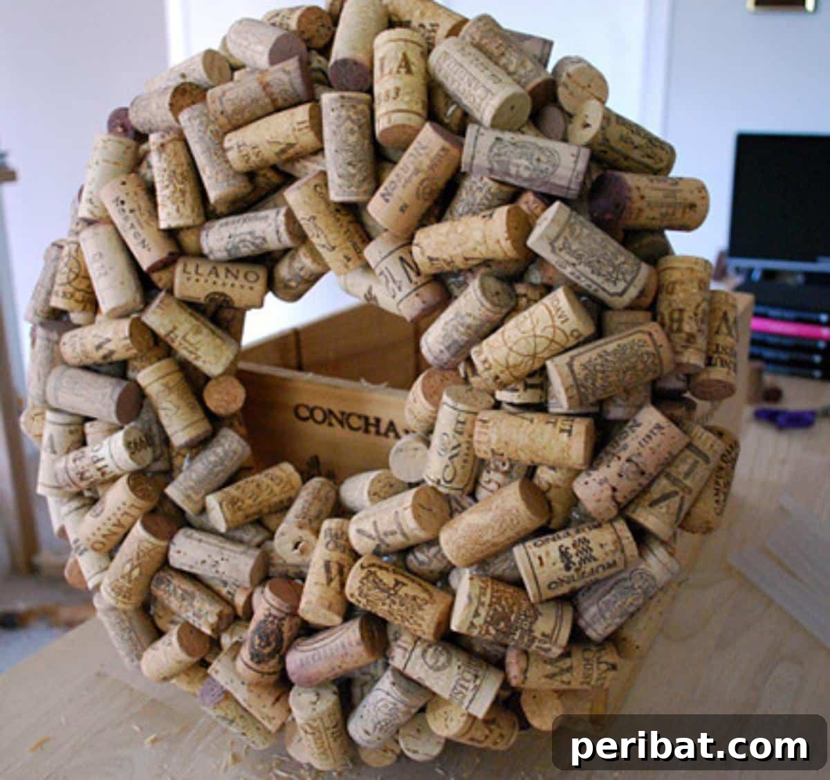 Uncork Your Creativity with DIY Wine Cork Projects 21 Decorative wreath crafted from hundreds of wine corks