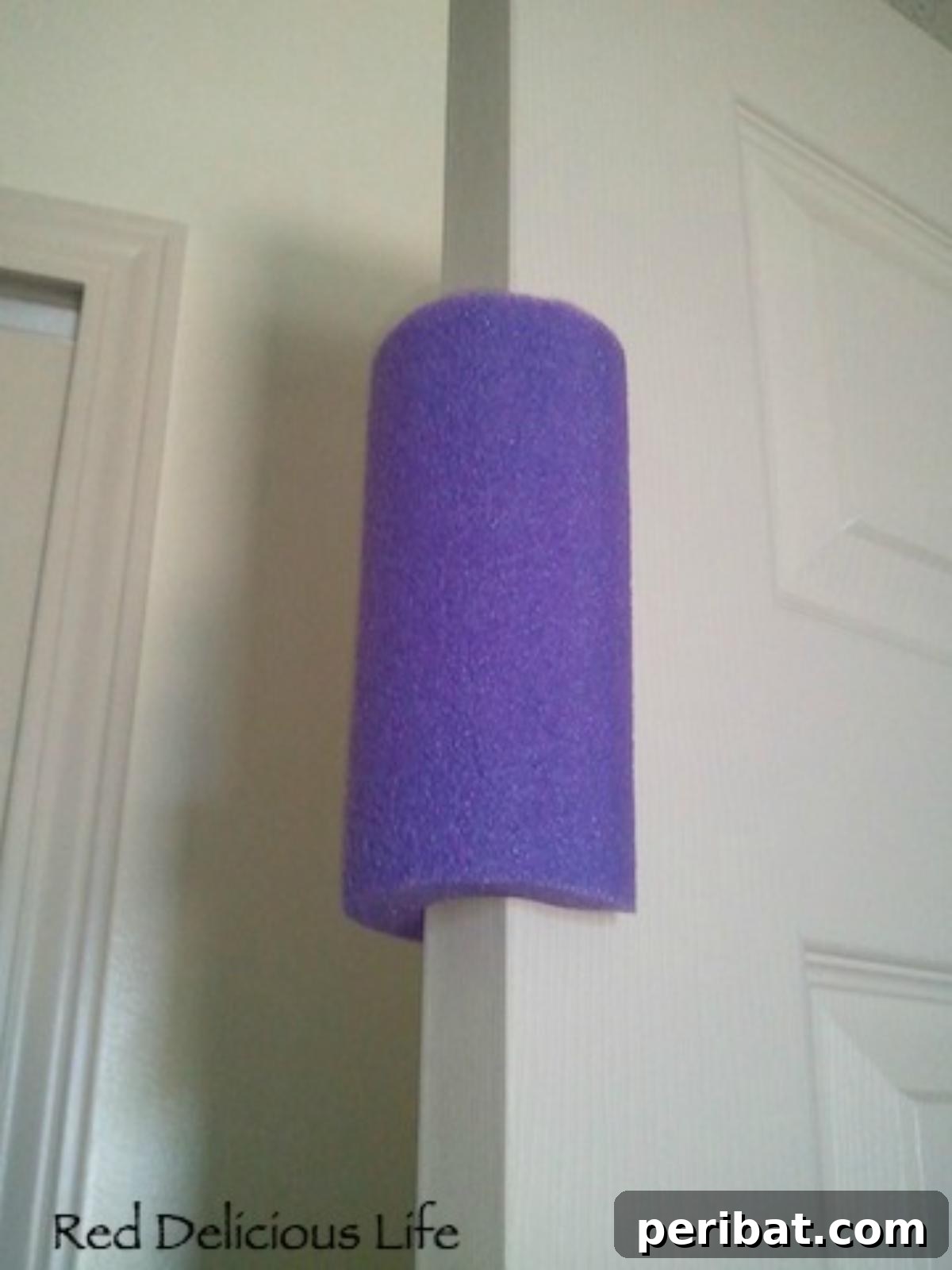 Toddler-proof door stopper made from a pool noodle