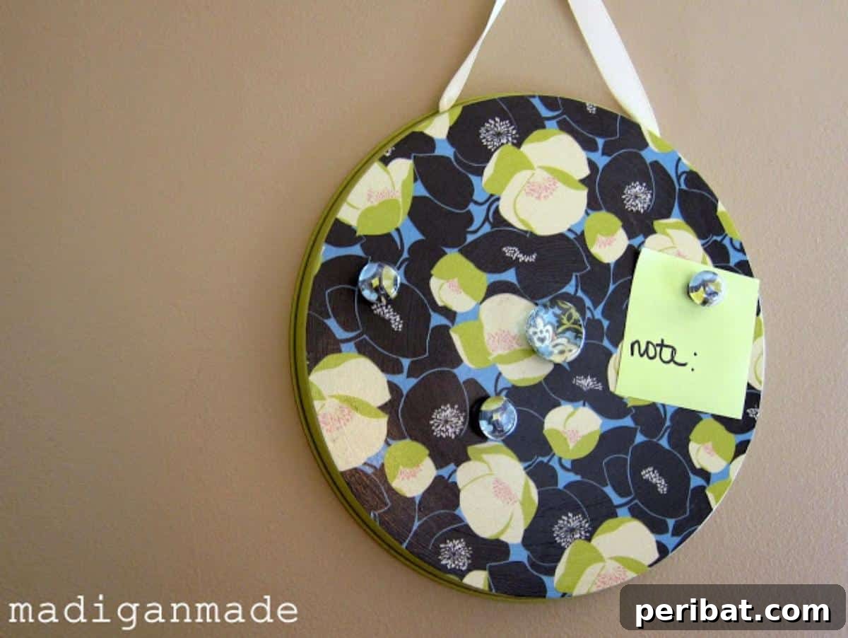 DIY magnetic memo board crafted from Dollar Store metal burner covers
