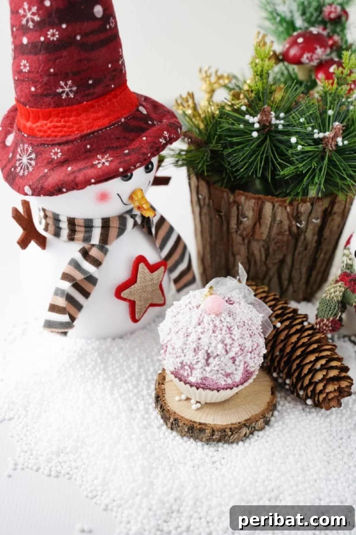 Sparkling DIY Cupcake Christmas Ornaments 12 A completed muffin cupcake ornament displayed on a counter surrounded by various holiday decorations, showcasing its festive appeal