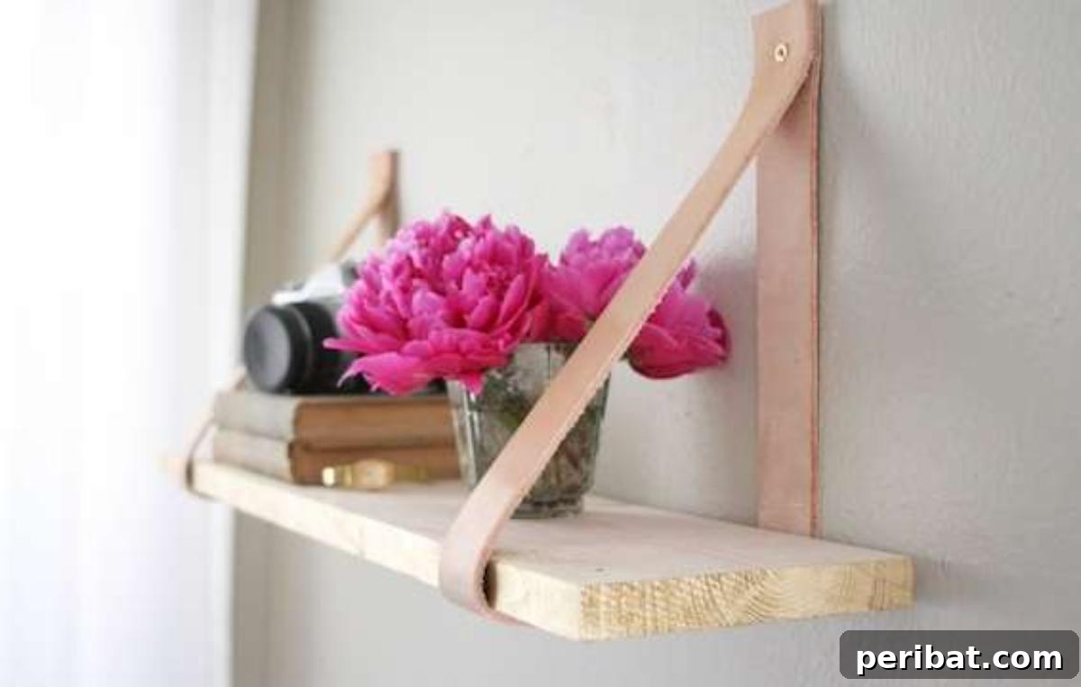 Ingenious DIY Shelving Projects to Transform Your Living Space 20 DIY Leather Strapped Shelf
