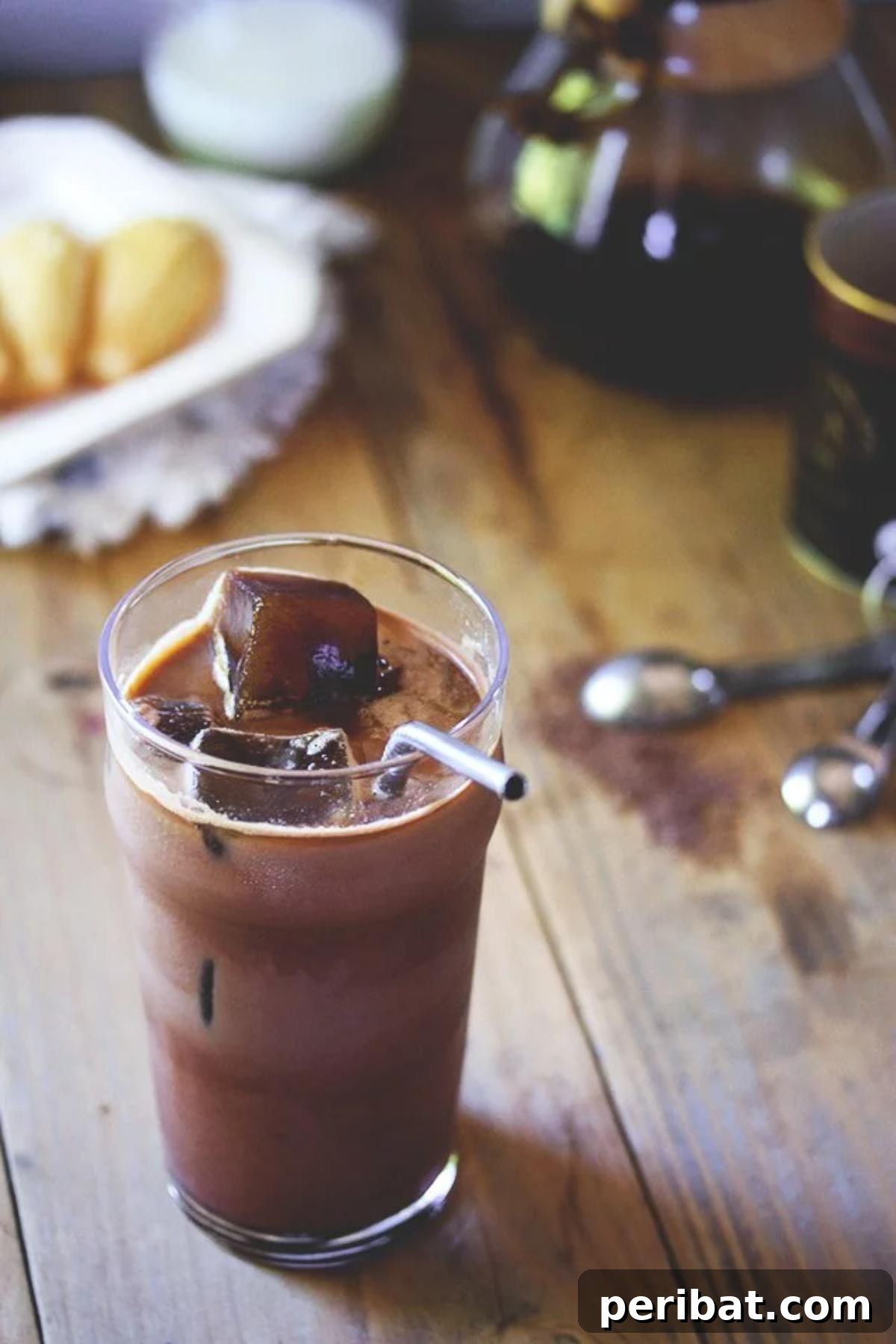 A glass of coffee drink with ice