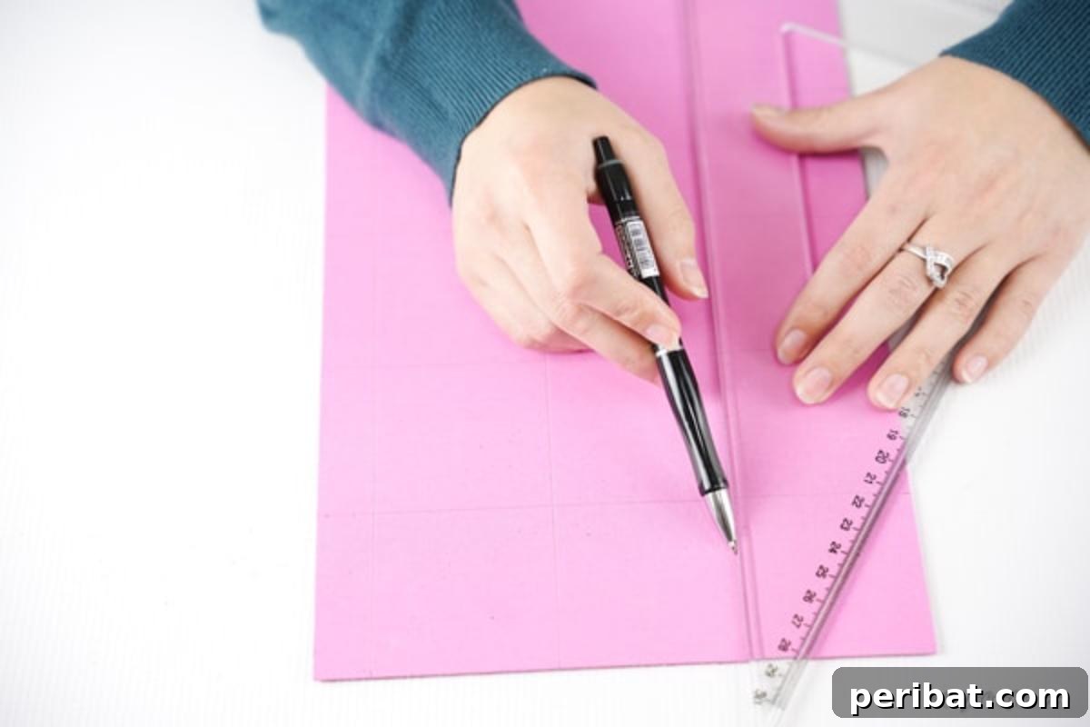 Shimmering Pink Paper Bloom Basket 8 Tracing lines on foam paper for squares, showing precise measurement for uniform pieces