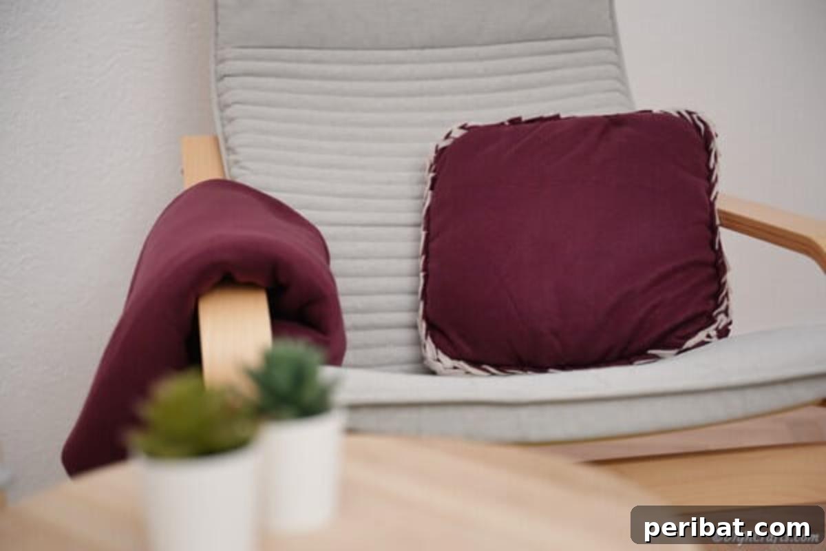 Easy 30-Minute No-Sew Reversible Fleece Pillow 21 A beautifully crafted no-sew pillowcase artfully arranged on a comfortable deck chair.